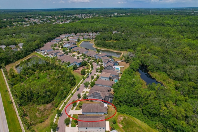 11401 Quiet Forest Dr, Tampa, FL 33635 - aerial overview of property's location with a forest, a nearby body of water, and nearby suburban area