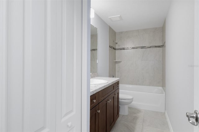12192 Eskimo Curlew Rd, Weeki Wachee, FL 34614 - bathroom featuring vanity, shower / bath combination, toilet, tile patterned flooring, and baseboards