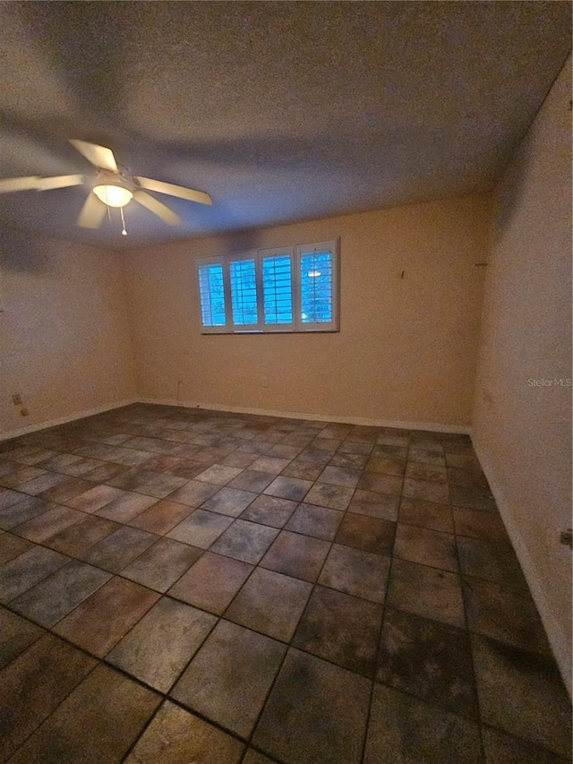 6339 Delaware Ave, New Port Richey, FL 34653 - empty room featuring ceiling fan and baseboards
