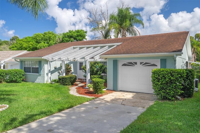 8021 Wildflower Row, Hudson, FL 34667 - ranch-style house with a garage, a front yard, stucco siding, a shingled roof, and concrete driveway