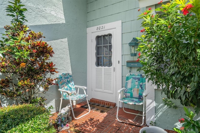 8021 Wildflower Row, Hudson, FL 34667 - property entrance featuring stucco siding