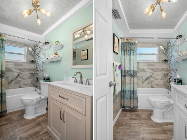 8021 Wildflower Row, Hudson, FL 34667 - bathroom featuring toilet, shower / bathtub combination with curtain, healthy amount of natural light, and a textured ceiling
