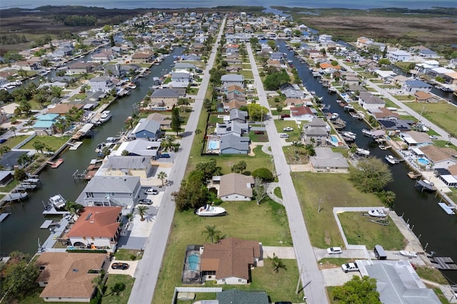 7520 Mako Dr, Hudson, FL 34667 - aerial overview of property's location with nearby suburban area and a large body of water