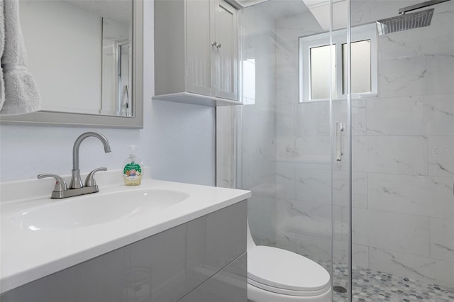 7520 Mako Dr, Hudson, FL 34667 - bathroom featuring a marble finish shower, toilet, and vanity