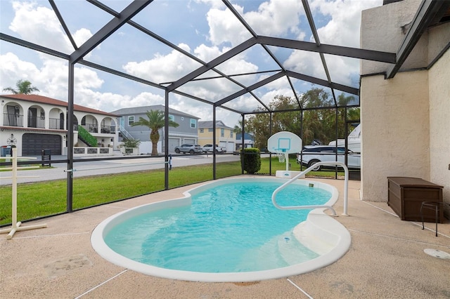 7520 Mako Dr, Hudson, FL 34667 - swimming pool with a yard, a residential view, a patio area, and glass enclosure