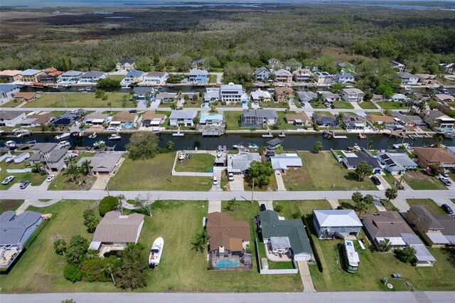 7520 Mako Dr, Hudson, FL 34667 - view of property location with a heavily wooded area, nearby suburban area, and a nearby body of water