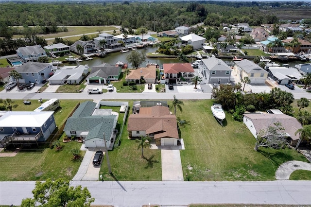 7520 Mako Dr, Hudson, FL 34667 - aerial view of property and surrounding area featuring nearby suburban area and a large body of water