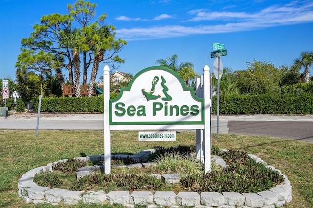 7520 Mako Dr, Hudson, FL 34667 - community sign with a lawn