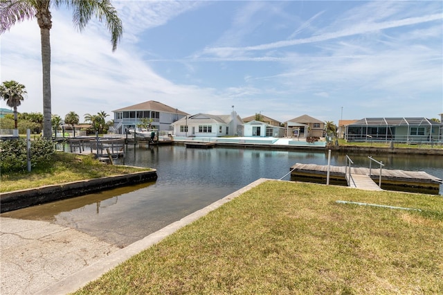 7520 Mako Dr, Hudson, FL 34667 - dock area with a water view, a residential view, and a lawn