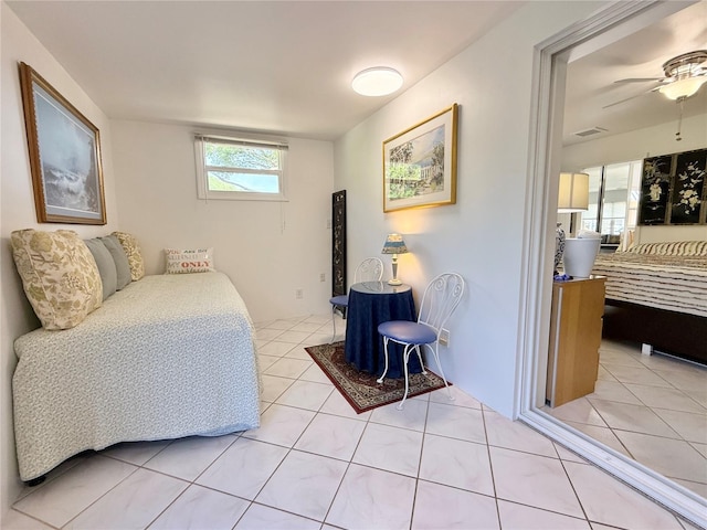 11631 Bayonet Ln, New Port Richey, FL 34654 - bedroom with light tile patterned floors
