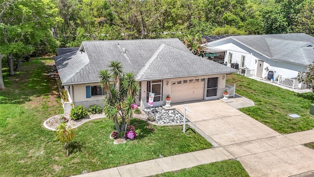 13003 Sandburst Ln, Hudson, FL 34667 - view of front of property with an attached garage, driveway, a shingled roof, a front yard, and brick siding