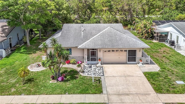 13003 Sandburst Ln, Hudson, FL 34667 - ranch-style house with roof with shingles, stucco siding, a garage, concrete driveway, and a front yard