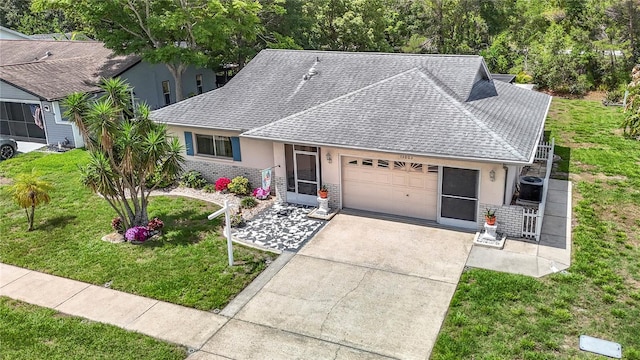13003 Sandburst Ln, Hudson, FL 34667 - ranch-style home with a shingled roof, concrete driveway, stucco siding, central air condition unit, and an attached garage