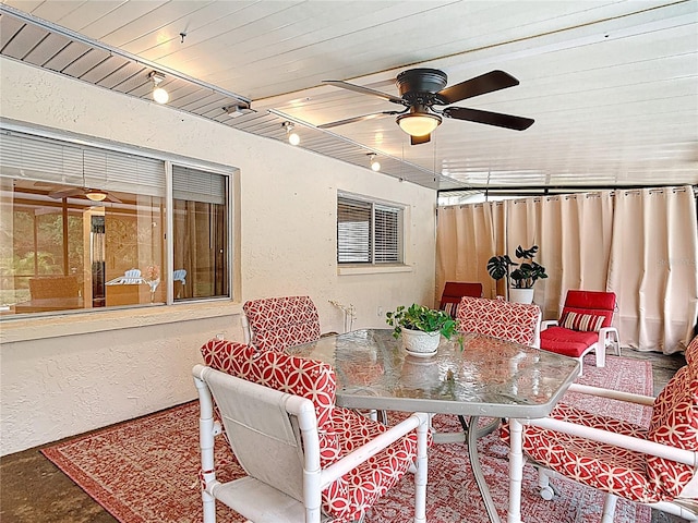 13003 Sandburst Ln, Hudson, FL 34667 - view of patio / terrace featuring outdoor dining area and a ceiling fan