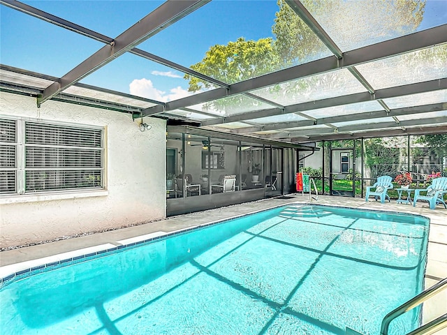 13003 Sandburst Ln, Hudson, FL 34667 - outdoor pool featuring a lanai and a patio