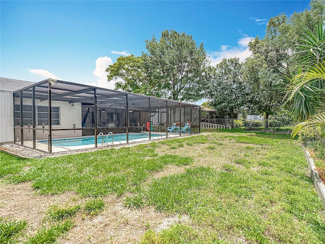 13003 Sandburst Ln, Hudson, FL 34667 - view of yard featuring an outdoor pool and glass enclosure