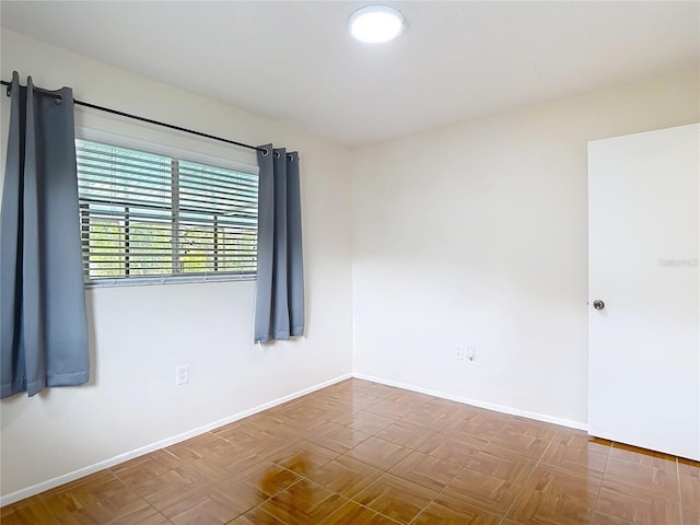 13003 Sandburst Ln, Hudson, FL 34667 - unfurnished room with baseboards