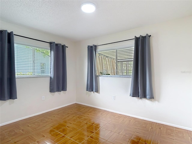 13003 Sandburst Ln, Hudson, FL 34667 - spare room with baseboards