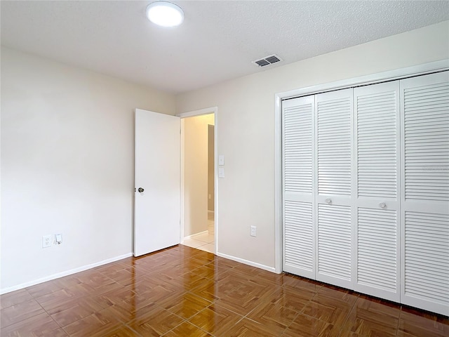 13003 Sandburst Ln, Hudson, FL 34667 - unfurnished bedroom featuring a closet and baseboards