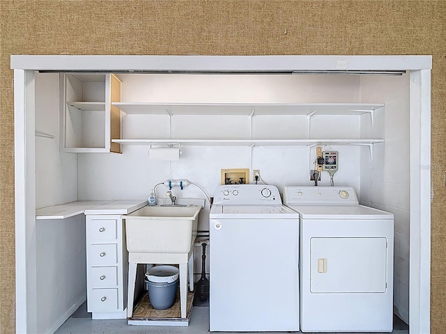 13003 Sandburst Ln, Hudson, FL 34667 - clothes washing area with separate washer and dryer