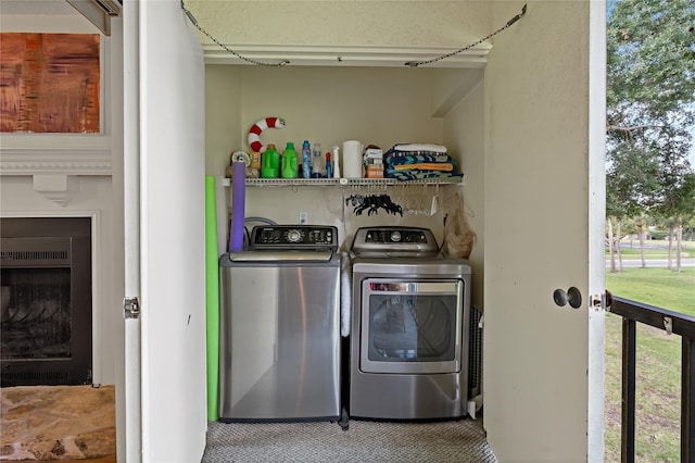 306 Martha Ln Unit 42, Oldsmar, FL 34677 - laundry room featuring washing machine and clothes dryer and carpet floors