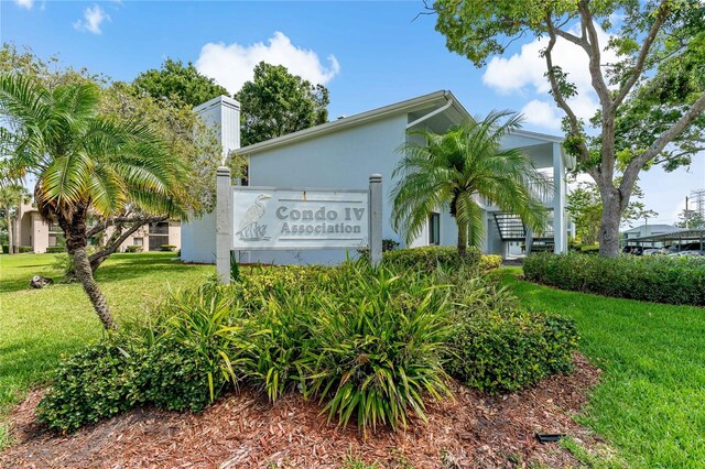 306 Martha Ln Unit 42, Oldsmar, FL 34677 - community sign with a lawn