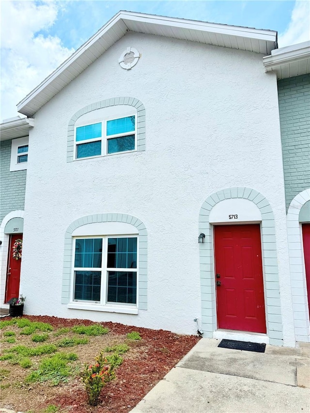 view of property with stucco siding