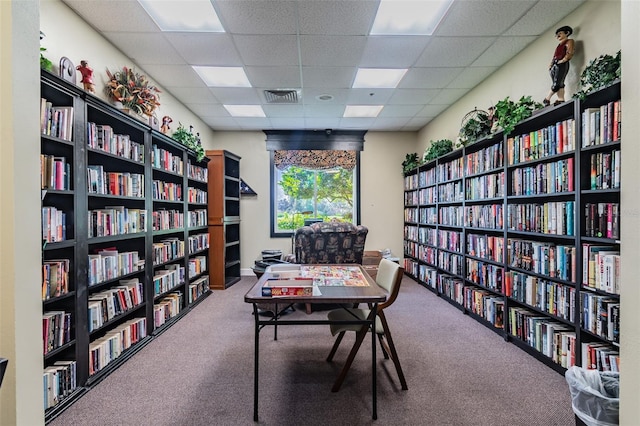 20720 Eustis Rd, Land O Lakes, FL 34637 - carpeted home office with bookshelves and a drop ceiling