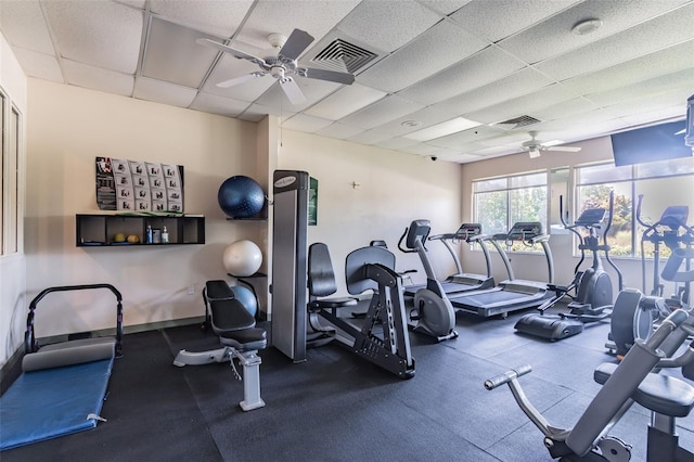 20720 Eustis Rd, Land O Lakes, FL 34637 - workout area with ceiling fan, a paneled ceiling, and baseboards