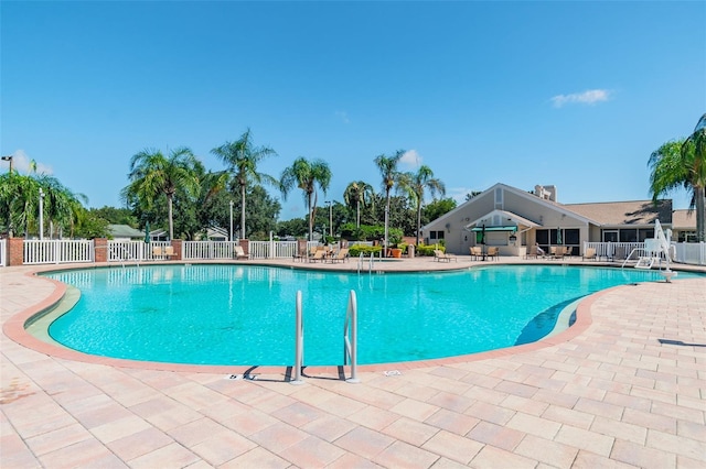20720 Eustis Rd, Land O Lakes, FL 34637 - community pool with fence and a patio area