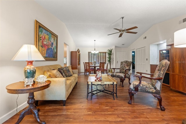 7512 Heather Walk Dr, Weeki Wachee, FL 34613 - living room with lofted ceiling, wood finished floors, a ceiling fan, and a chandelier