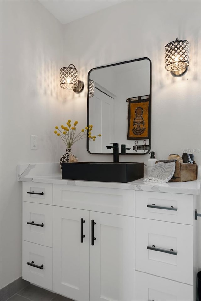 bathroom featuring vanity and tile patterned flooring