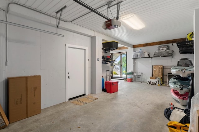 garage featuring a garage door opener