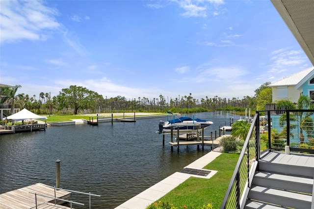 5234 Foxhall Ct, Weeki Wachee, FL 34607 - dock area featuring a water view and a lawn
