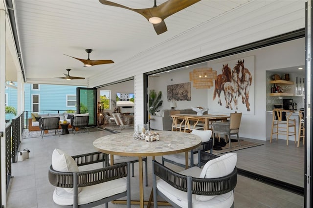 5234 Foxhall Ct, Weeki Wachee, FL 34607 - view of patio featuring a ceiling fan, an outdoor hangout area, and outdoor dining area