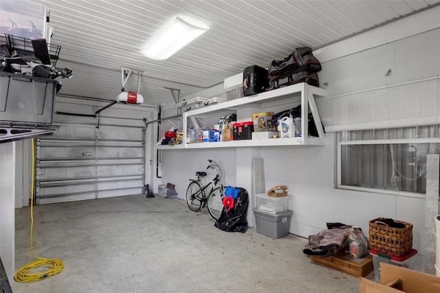5234 Foxhall Ct, Weeki Wachee, FL 34607 - garage featuring a garage door opener