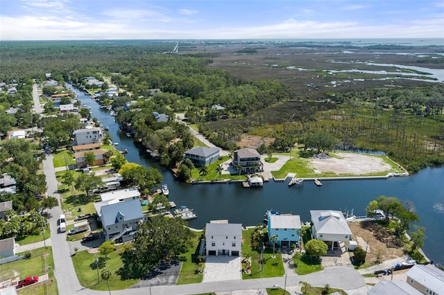 5234 Foxhall Ct, Weeki Wachee, FL 34607 - aerial view of residential area with a nearby body of water and a forest