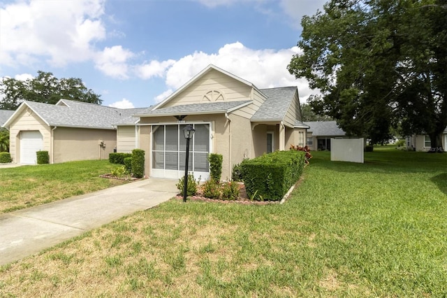 4837 Boonesboro Ct, New Port Richey, FL 34655 - ranch-style house featuring a front yard, stucco siding, a shingled roof, and a garage