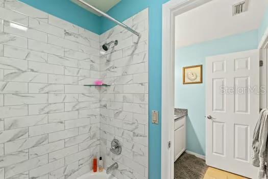 5216 Hope Ln, Spring Hill, FL 34606 - bathroom with  shower combination and vanity