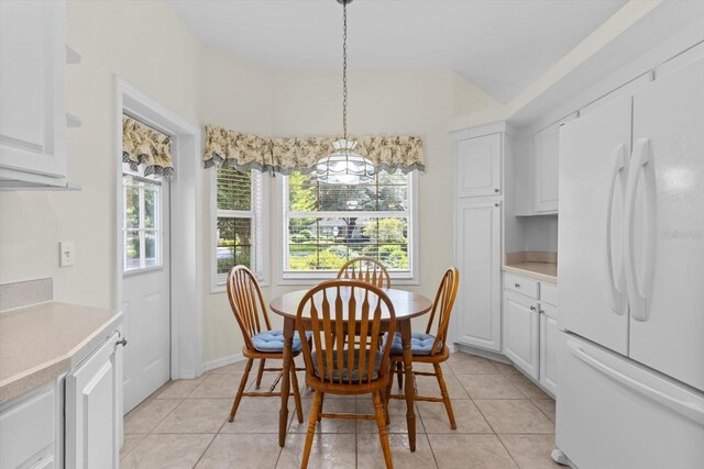 6240 W Glynborne Loop, Crystal River, FL 34429 - dining room featuring a chandelier, plenty of natural light, and light tile patterned floors