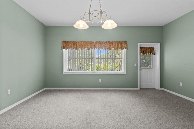 6240 W Glynborne Loop, Crystal River, FL 34429 - carpeted empty room featuring baseboards and a chandelier