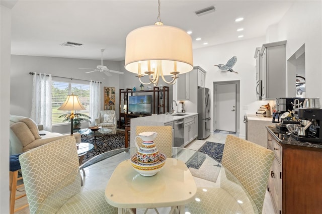 7367 Willow Brook Dr, Spring Hill, FL 34606 - dining space featuring ceiling fan, recessed lighting, and a chandelier