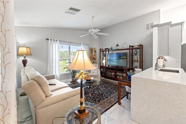 7367 Willow Brook Dr, Spring Hill, FL 34606 - living room with ceiling fan and light marble finish floors