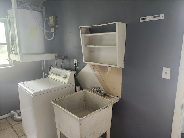 washroom with washer / dryer