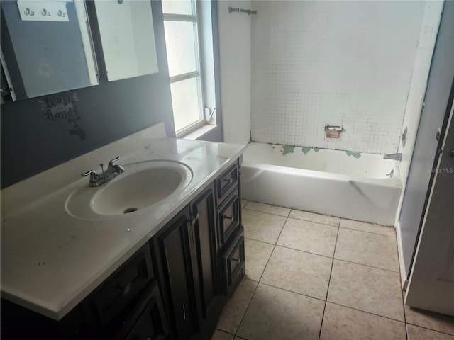 full bath featuring vanity and tile patterned floors