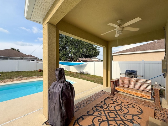 view of patio / terrace featuring ceiling fan and a fenced backyard