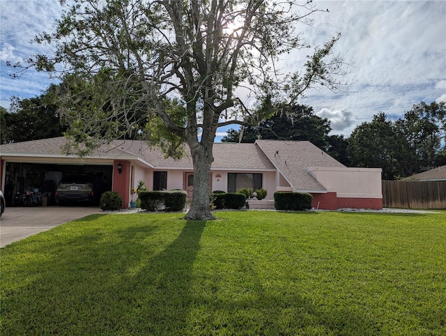 view of front of house featuring a garage, driveway, and a shingled roof