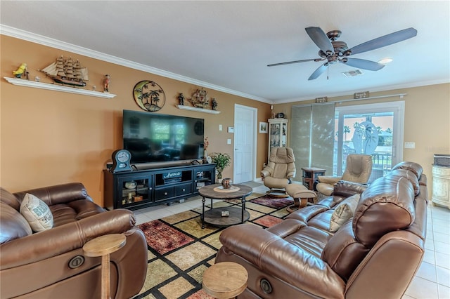 living room with light tile patterned floors, ceiling fan, and ornamental molding