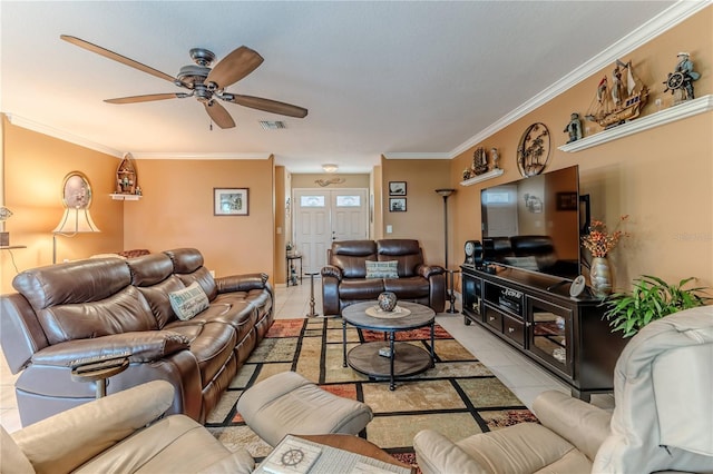 living room featuring light tile patterned floors, crown molding, and a ceiling fan