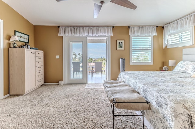 bedroom with access to outside, carpet flooring, ceiling fan, and baseboards